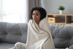 Woman cold in her home